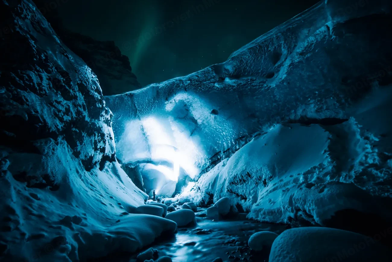 Inside a glowing blue ice cave in Iceland