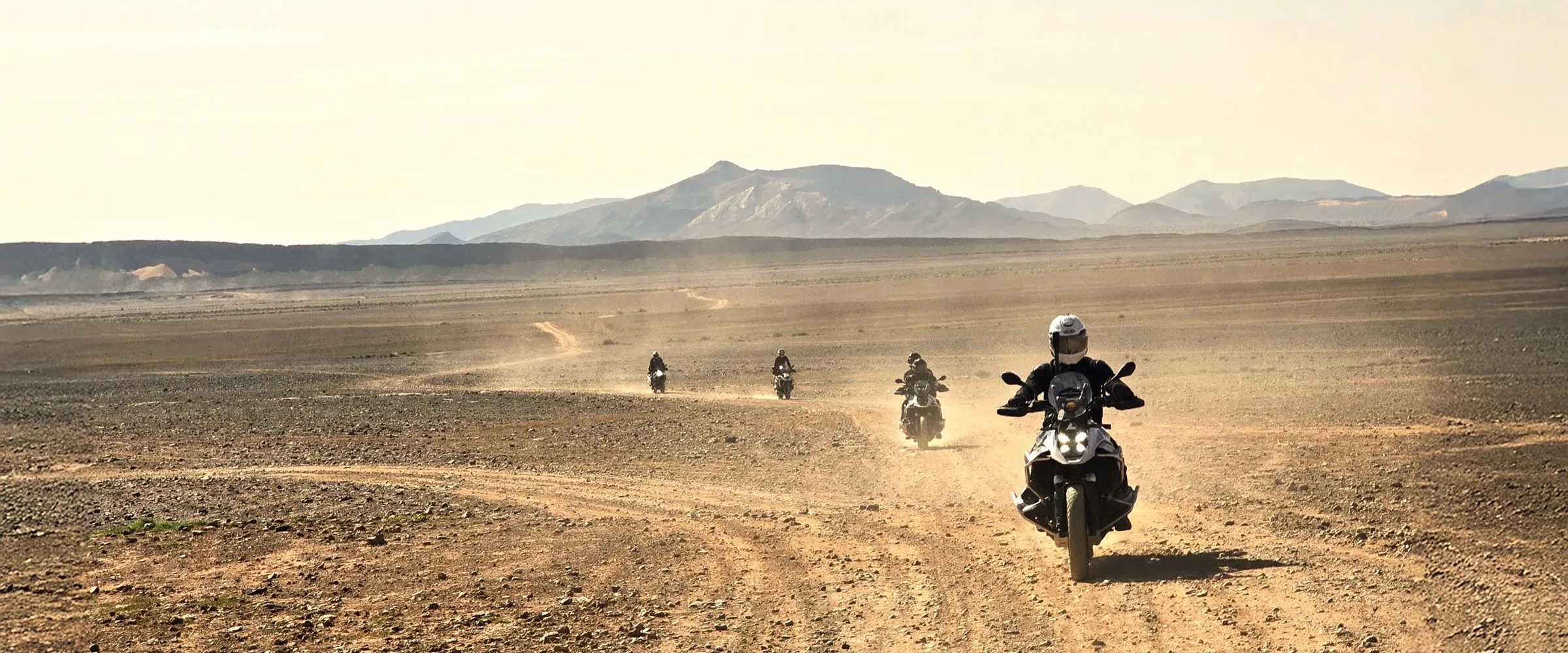 Motorcycles riding through the Atlas Mountains on the Morocco tour
